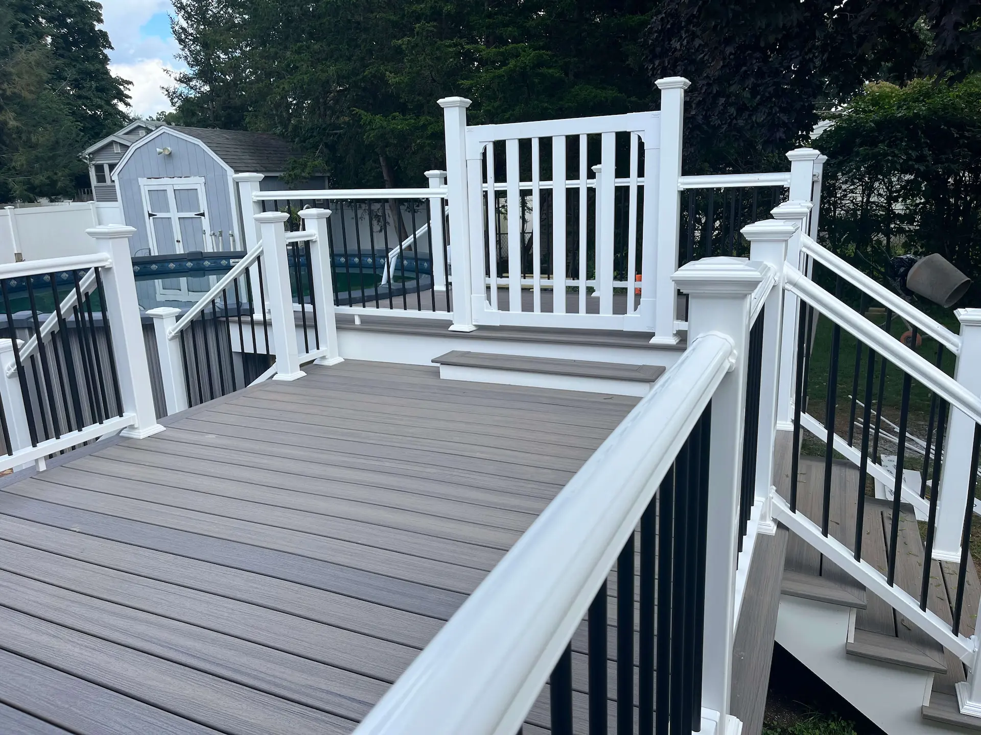Low maintenance pool deck Deck remodeling Deck construction Back yard upgrade Vinyl deck Vinyl decking Composite decking deck builder near me deck contractors near me Low maintenance deck