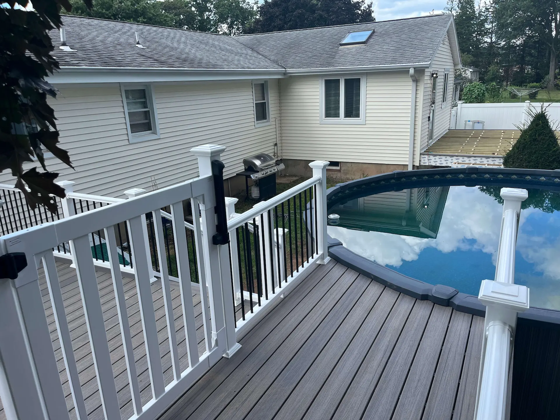 Low maintenance pool deck Deck remodeling Deck construction Back yard upgrade Vinyl deck Vinyl decking Composite decking deck builder near me deck contractors near me Low maintenance deck