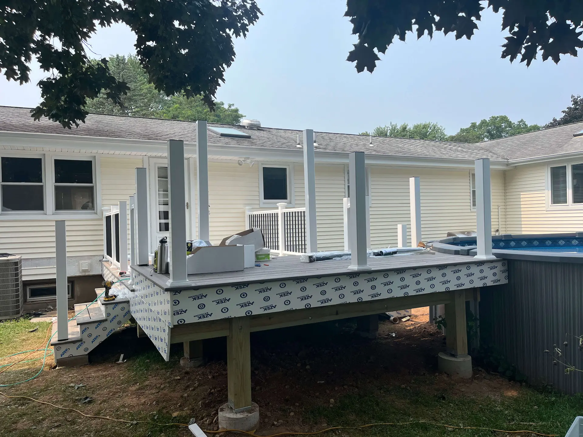 Low maintenance pool deck Deck remodeling Deck construction Back yard upgrade Vinyl deck Vinyl decking Composite decking deck builder near me deck contractors near me Low maintenance deck