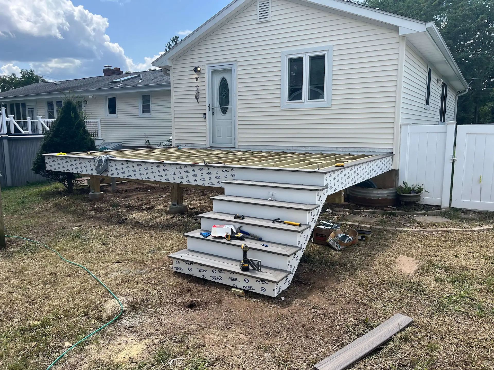 Low maintenance pool deck Deck remodeling Deck construction Back yard upgrade Vinyl deck Vinyl decking Composite decking deck builder near me deck contractors near me Low maintenance deck