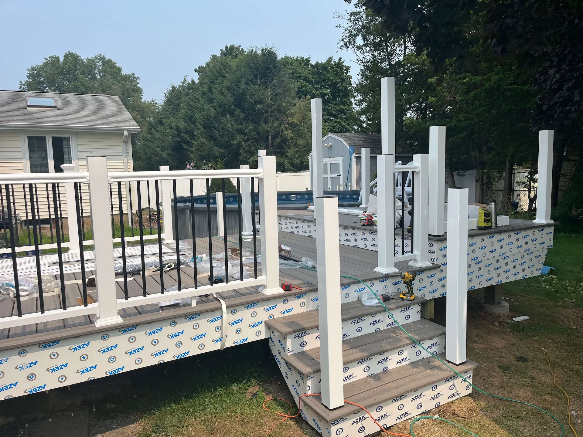 Low maintenance pool deck Deck remodeling Deck construction Back yard upgrade Vinyl deck Vinyl decking Composite decking deck builder near me deck contractors near me Low maintenance deck