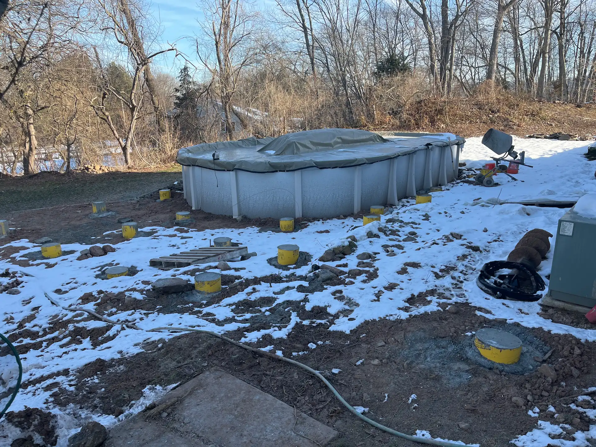 Staged TimberTech PVC pool deck Deck remodeling Deck construction Back yard upgrade Vinyl deck Vinyl decking Composite decking deck builder near me deck contractors near me PT deck with wire rails