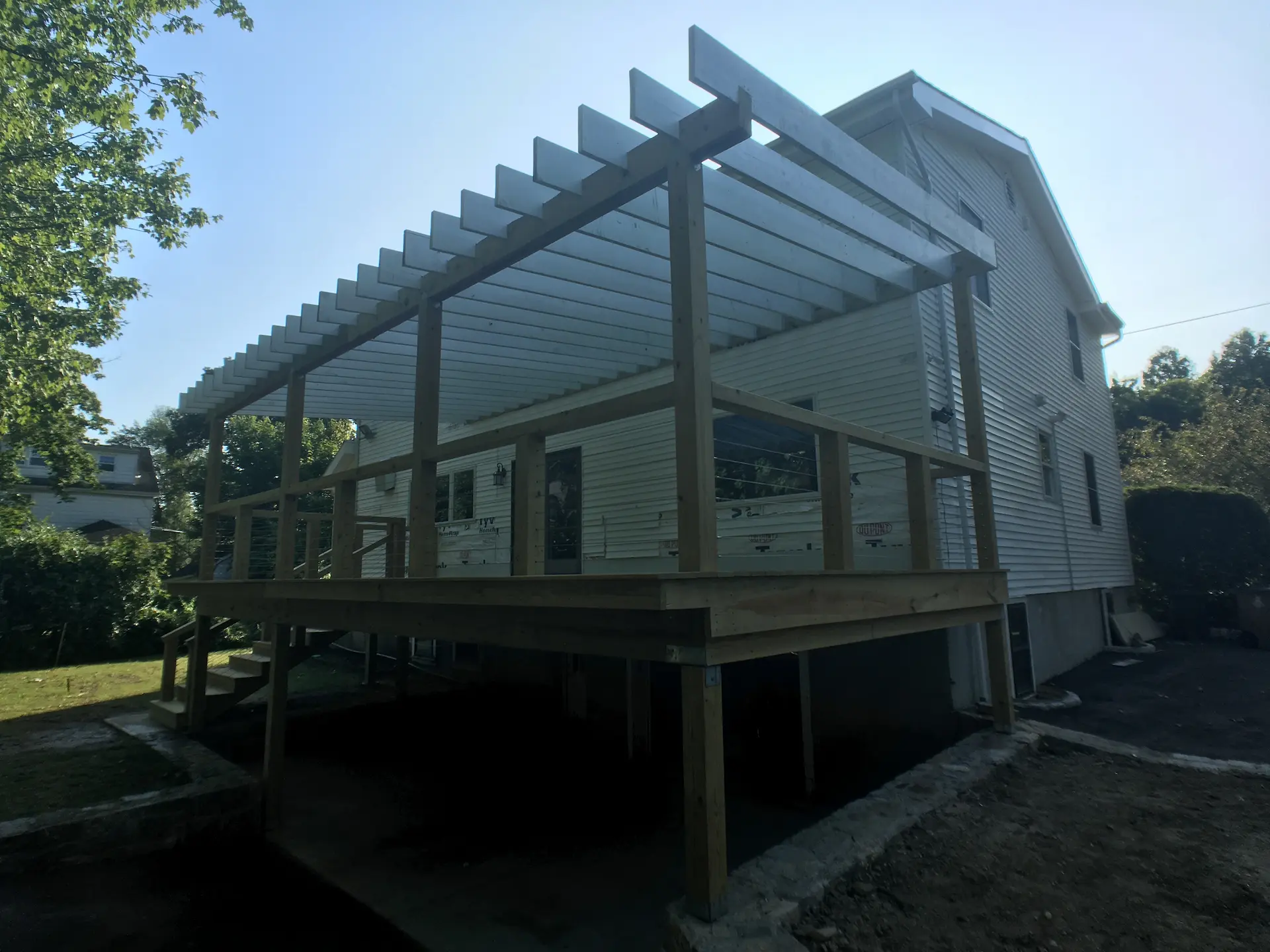 Deck remodeling Deck construction Back yard upgrade Vinyl deck Vinyl decking Composite decking deck builder near me deck contractors near me PT deck with wire rails