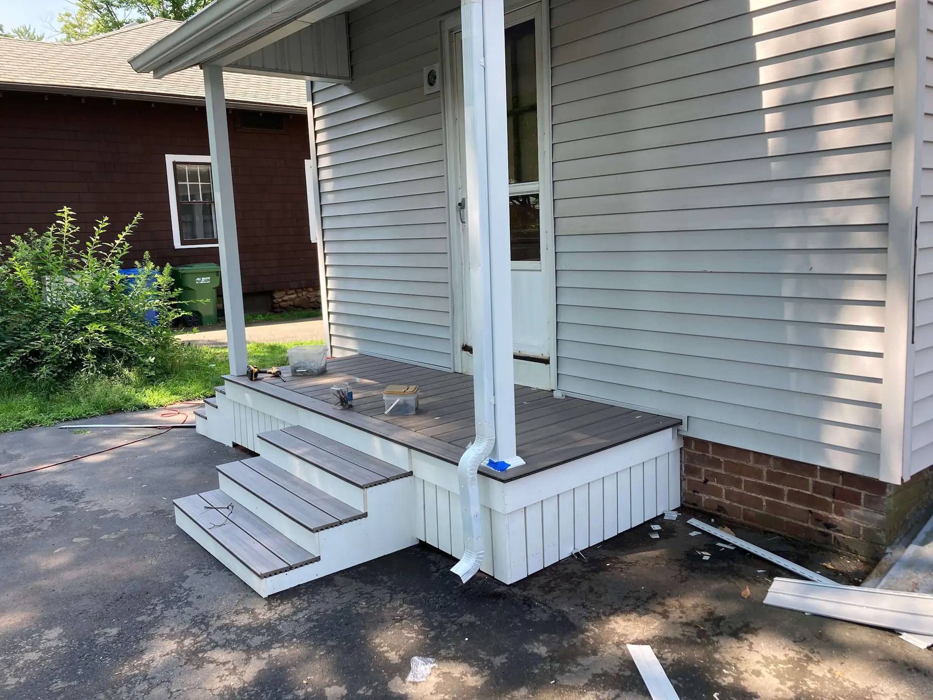 Deck remodeling Deck construction Back yard upgrade Vinyl deck Vinyl decking Composite decking deck builder near me deck contractors near me Trex porch with PVC skirting