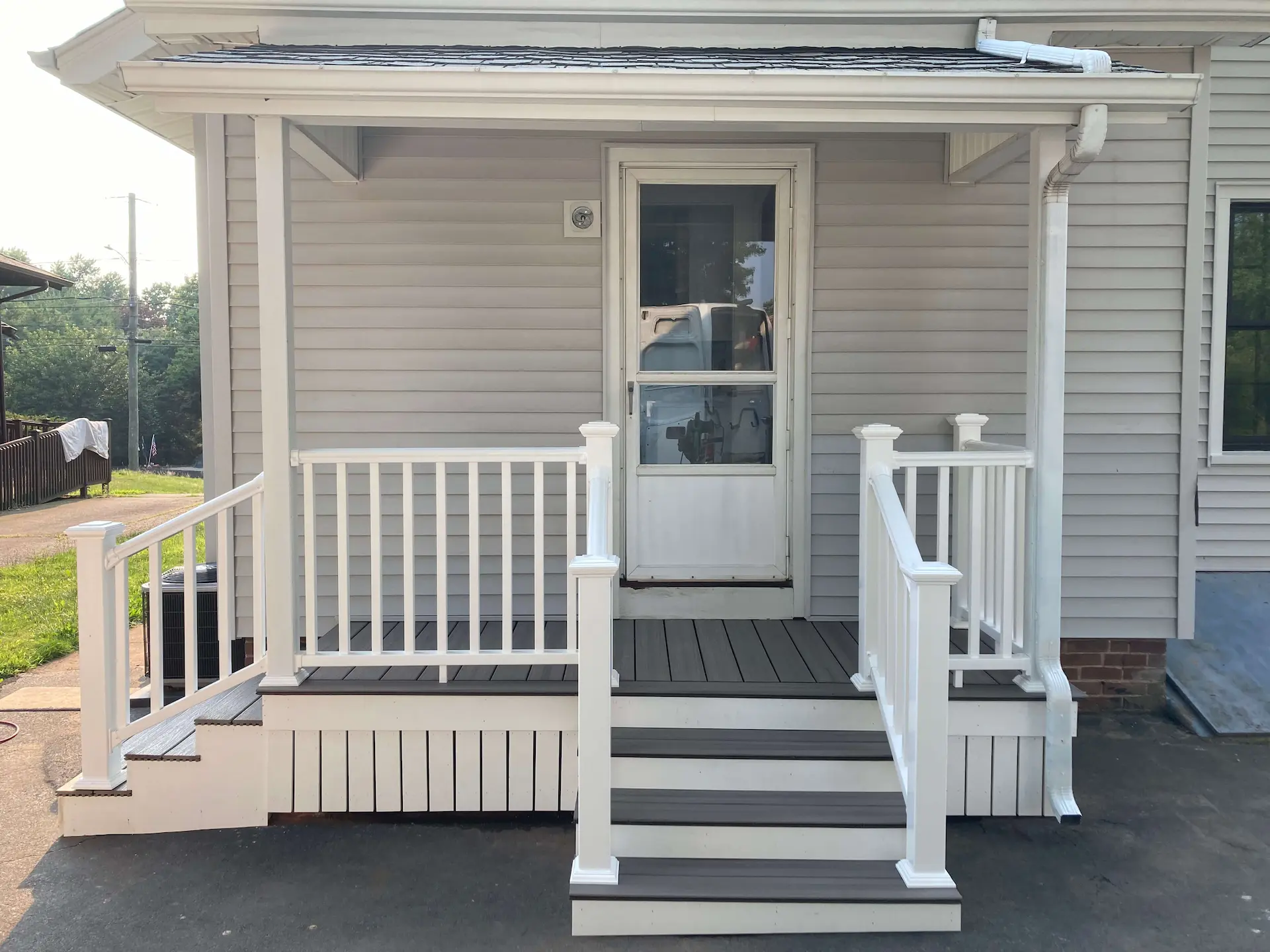Deck remodeling Deck construction Back yard upgrade Vinyl deck Vinyl decking Composite decking deck builder near me deck contractors near me Trex porch with PVC skirting
