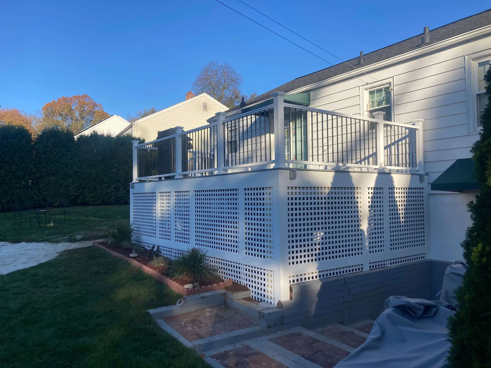 Enhance with square lattice Deck remodeling Deck construction Back yard upgrade Vinyl deck Vinyl decking Composite decking deck builder near me deck contractors near me PT deck with wire rails