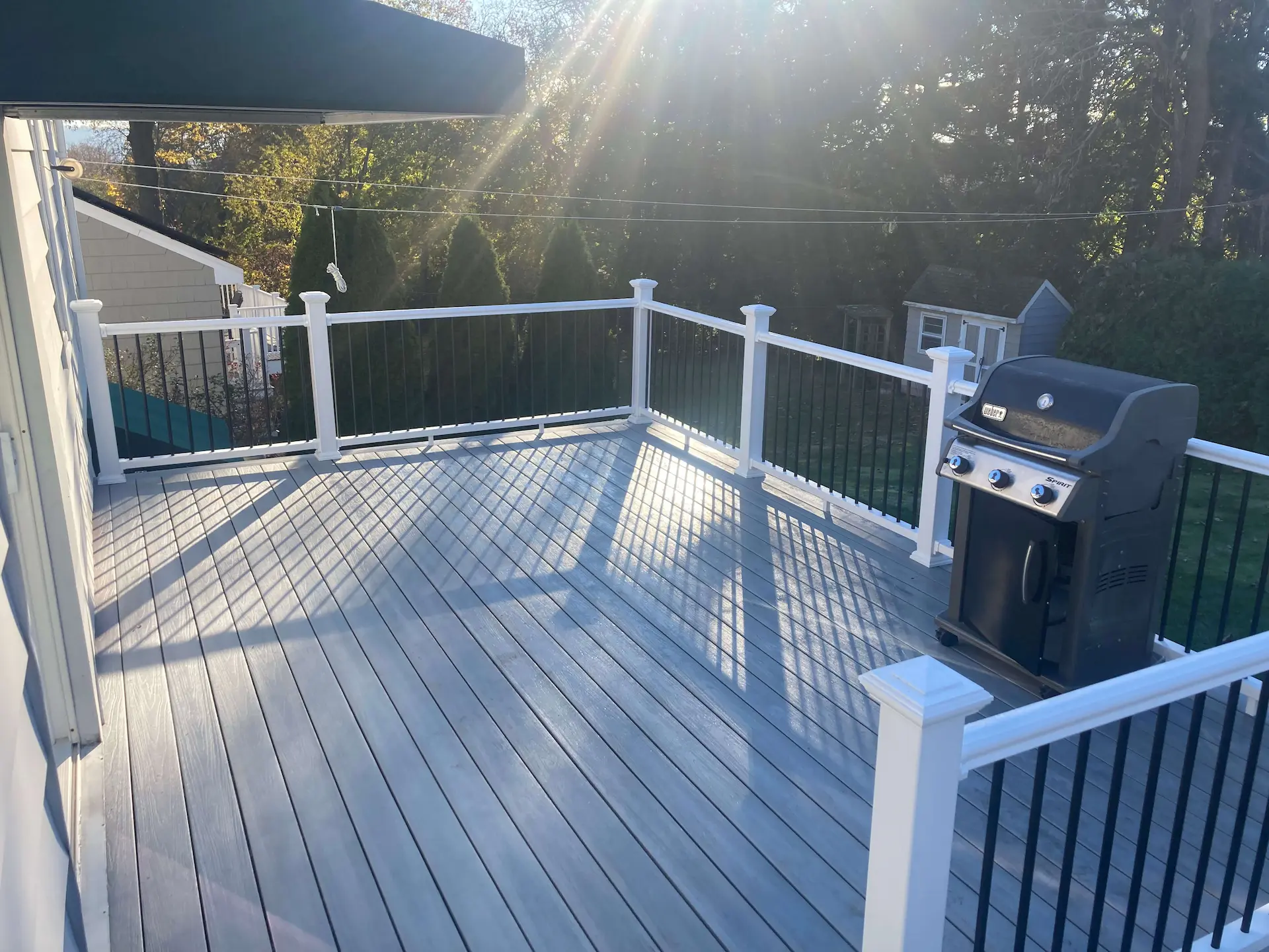 Enhance with square lattice Deck remodeling Deck construction Back yard upgrade Vinyl deck Vinyl decking Composite decking deck builder near me deck contractors near me PT deck with wire rails